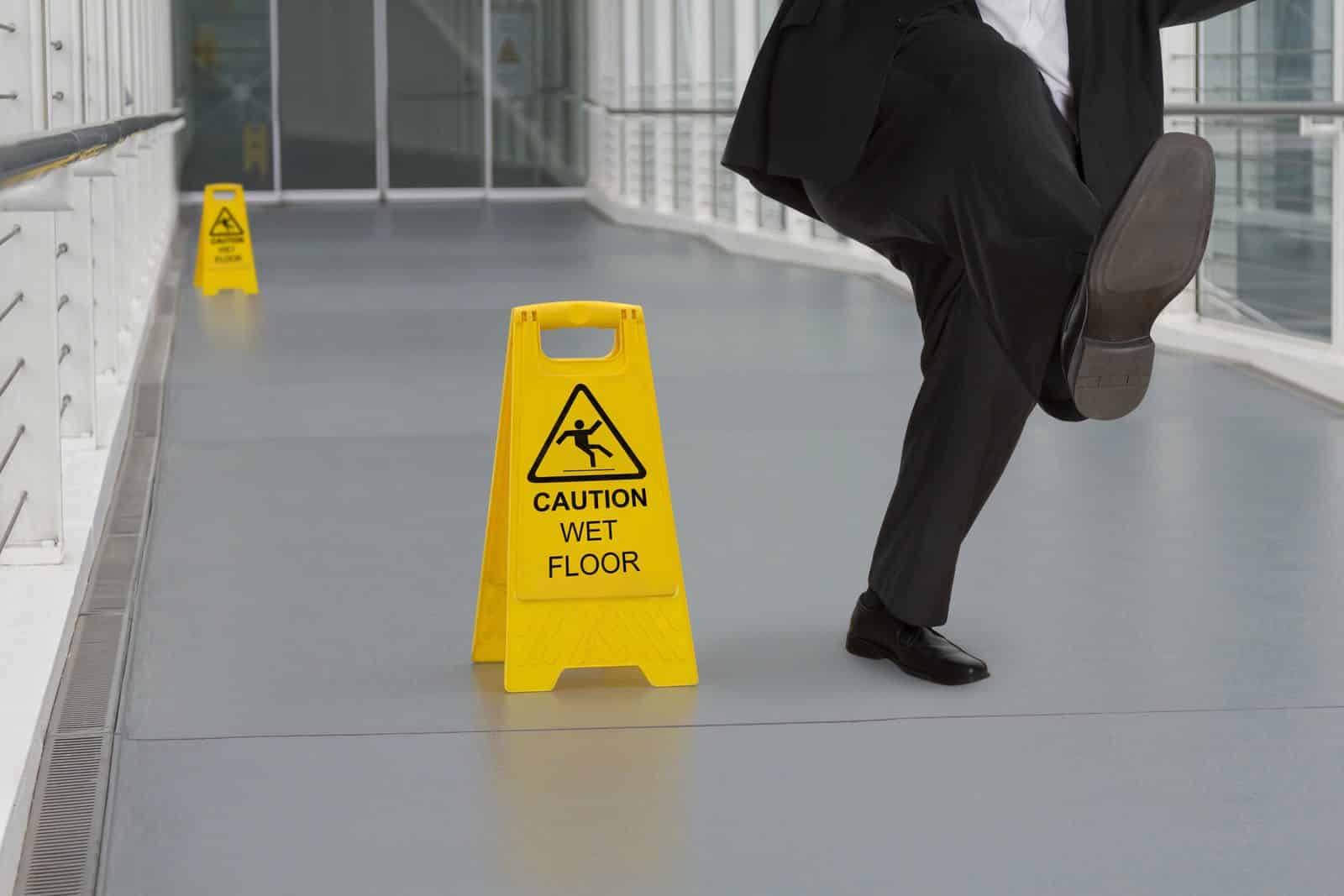 A shopper slipping on an unmarked wet floor in a Memphis, Tennessee store