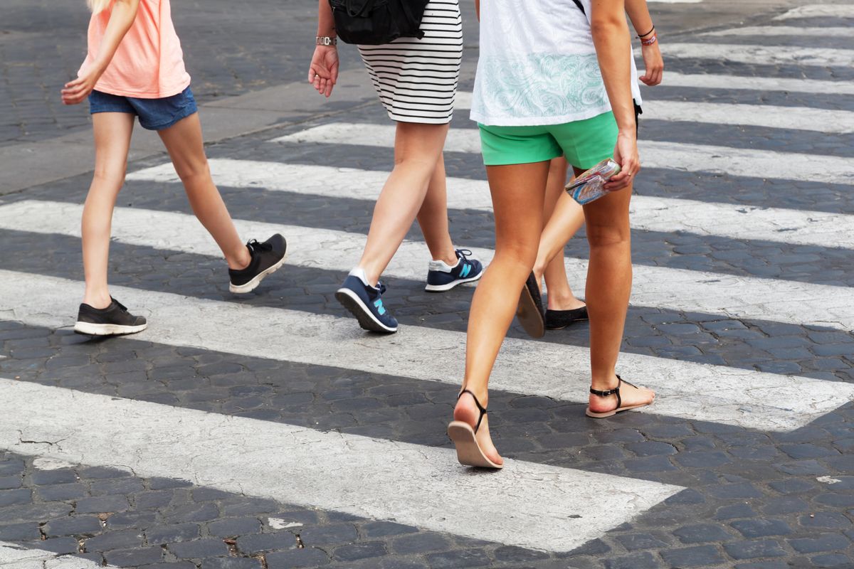 Pedestrians crossing at a marked crosswalk in Southaven, Mississippi