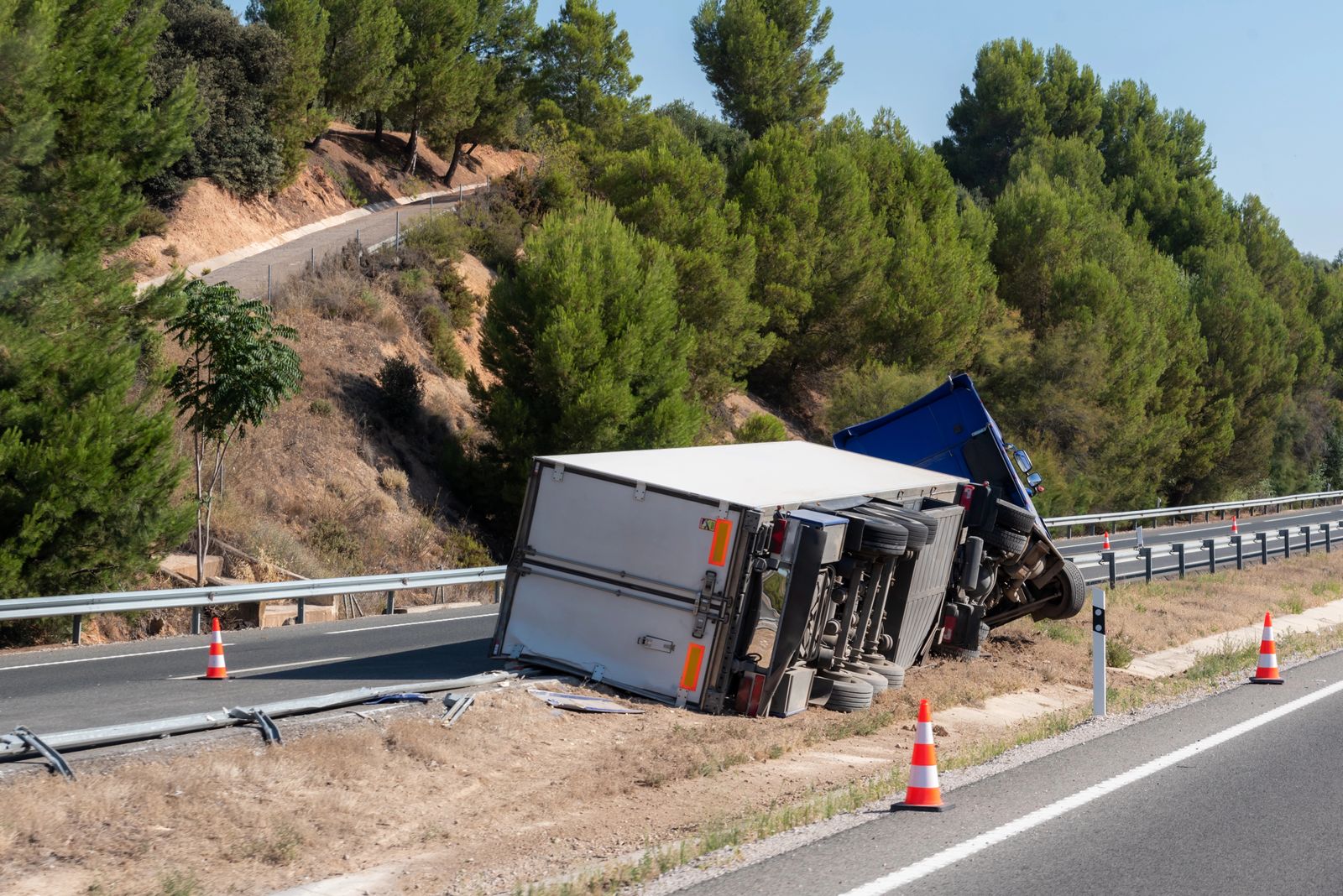 Overturned tractor-trailer on a highway shoulder after a truck accident near Southaven, Mississippi